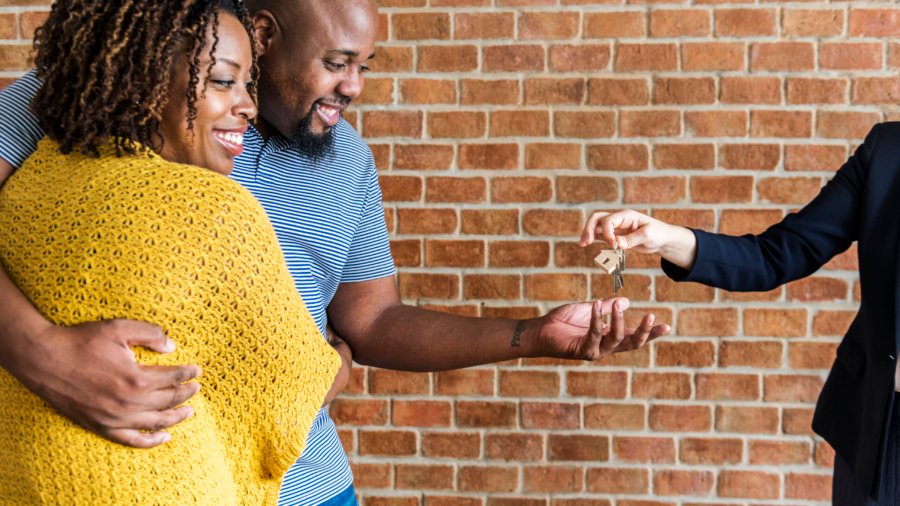 Black couple buy new house